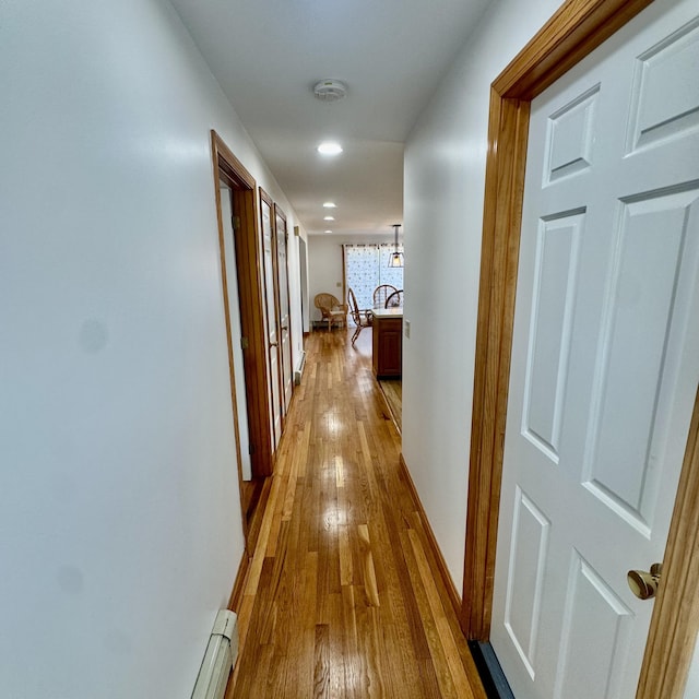 29 Lumberjack Trl, West Yarmouth, MA 02673 - hallway featuring hardwood / wood-style flooring, a chandelier, recessed lighting, a baseboard heating unit, and baseboards