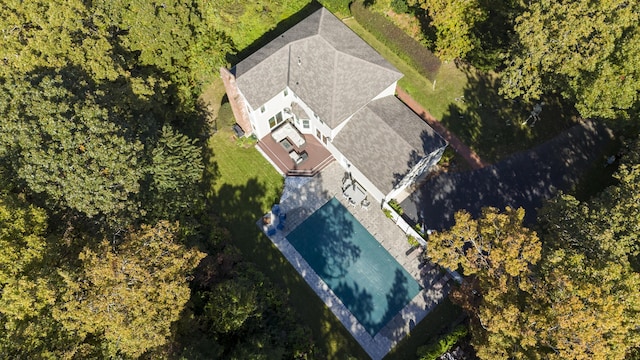 aerial view featuring a view of trees