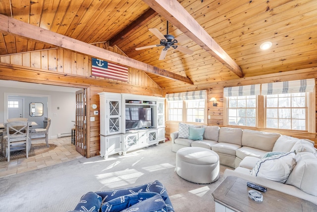 carpeted living area with a ceiling fan, wood walls, baseboard heating, wood ceiling, and vaulted ceiling with beams