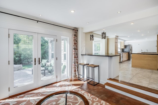 10 Westerly Dr, Bourne, MA 02532 - entryway featuring french doors, recessed lighting, and a sink