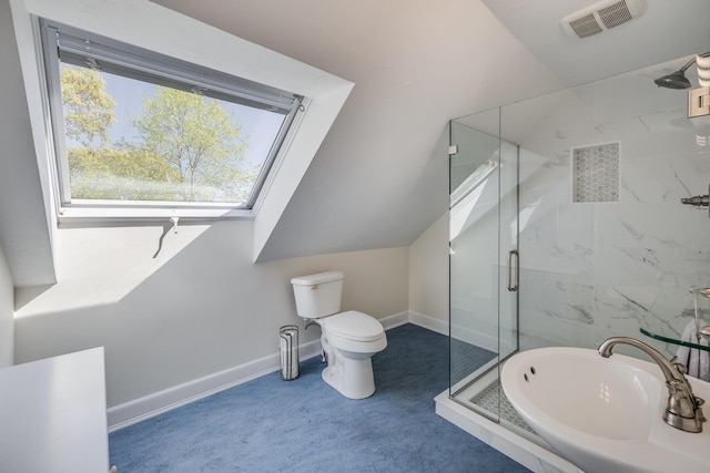 10 Westerly Dr, Bourne, MA 02532 - bathroom featuring a stall shower, toilet, and baseboards