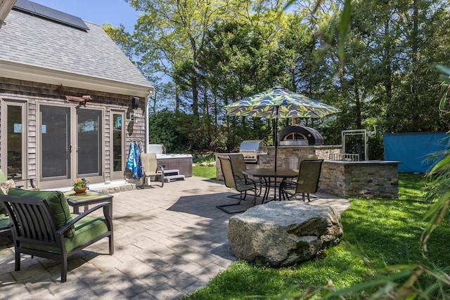 10 Westerly Dr, Bourne, MA 02532 - view of patio / terrace with an outdoor kitchen, outdoor dining space, and grilling area