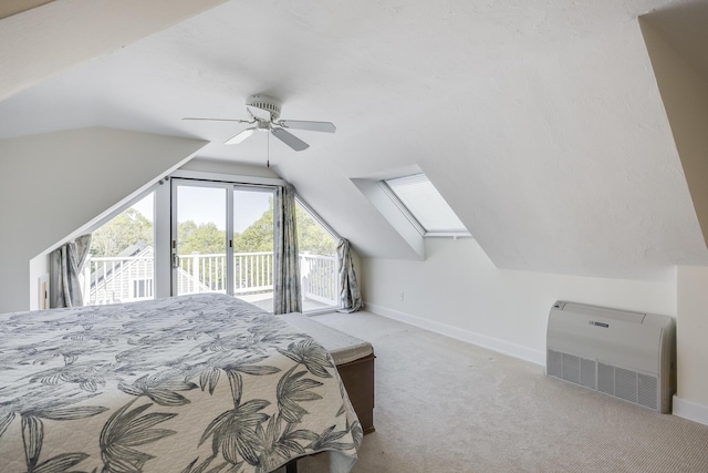 10 Westerly Dr, Bourne, MA 02532 - bedroom featuring access to exterior, carpet flooring, baseboards, lofted ceiling, and a ceiling fan