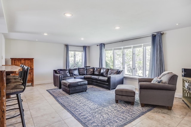 10 Westerly Dr, Bourne, MA 02532 - living room with recessed lighting, light tile patterned floors, and baseboards