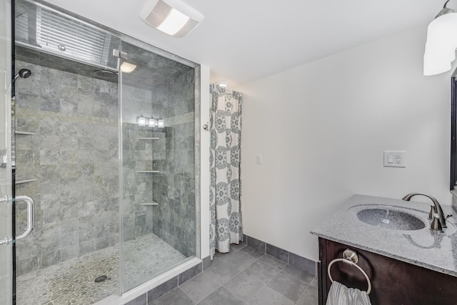 10 Westerly Dr, Bourne, MA 02532 - full bath featuring a shower stall, vanity, and baseboards