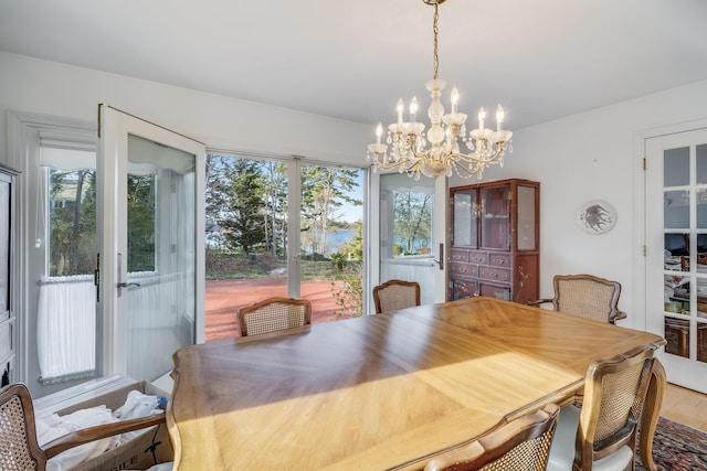 104 Seapine Rd, North Chatham, MA 02650 - dining space featuring a chandelier and wood finished floors