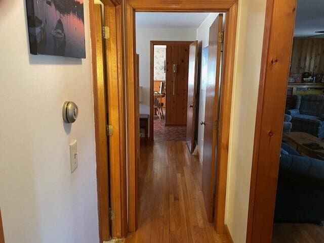 hallway with wood finished floors