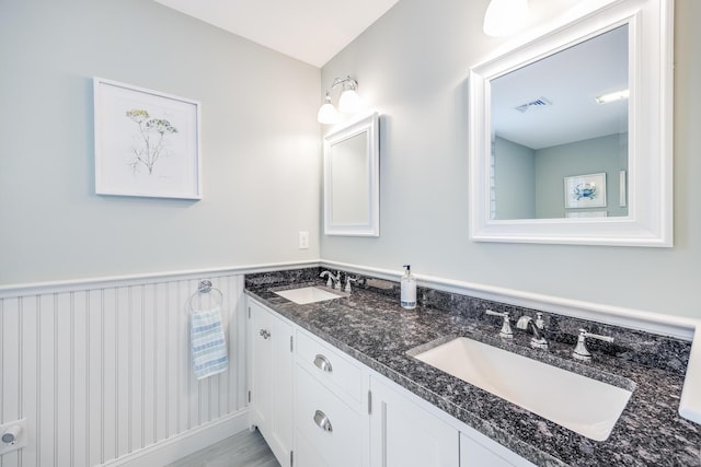 49 Atkins Rd, East Sandwich, MA 02537 - full bath with double vanity and wainscoting