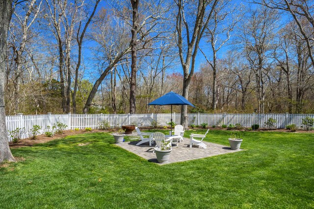49 Atkins Rd, East Sandwich, MA 02537 - fenced backyard featuring a patio area