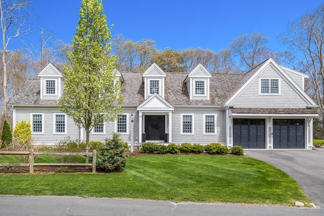 49 Atkins Rd, East Sandwich, MA 02537 - view of front of home featuring a front lawn, fence, and driveway