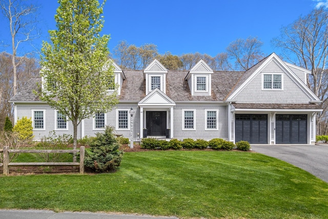 49 Atkins Rd, East Sandwich, MA 02537 - cape cod home featuring a front lawn, aphalt driveway, and fence