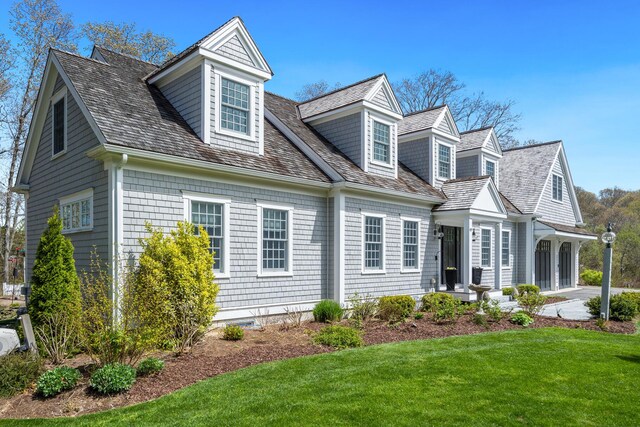 49 Atkins Rd, East Sandwich, MA 02537 - view of front of home featuring a front yard