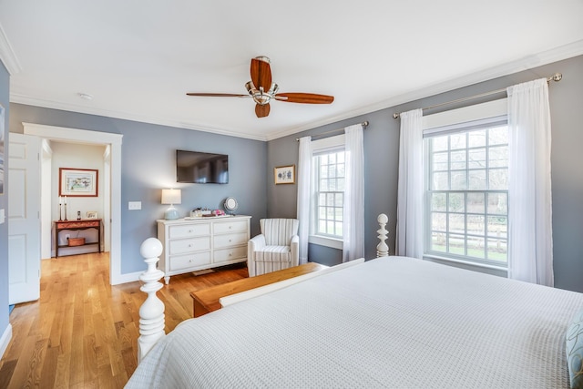 49 Atkins Rd, East Sandwich, MA 02537 - bedroom featuring crown molding, baseboards, a ceiling fan, and light wood-style flooring