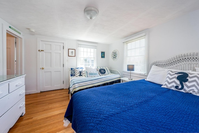 1006 Craigville Beach Rd Unit 4, Centerville, MA 02632 - bedroom featuring light wood-style flooring