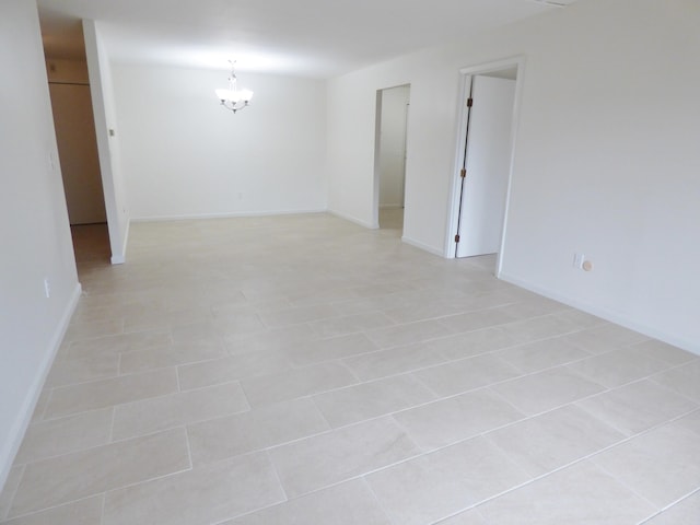 15 Oak Neck Rd Unit 2 12, Hyannis, MA 02601 - tiled spare room with an inviting chandelier