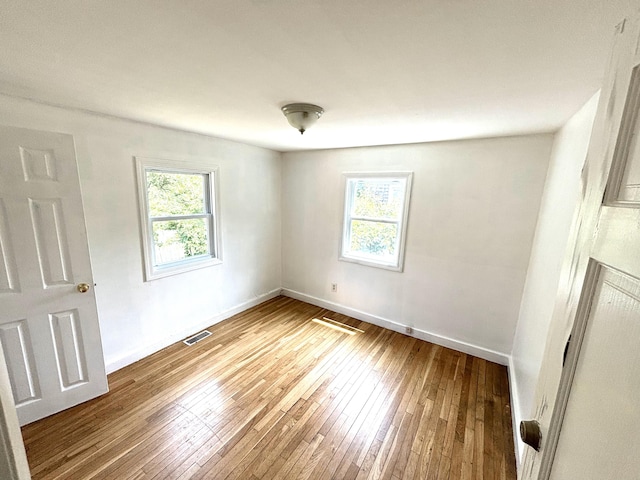 12 Amelia Way S, Yarmouth, MA 02664 - unfurnished room with wood-type flooring and baseboards