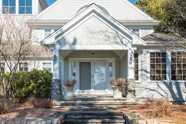 doorway to property featuring covered porch