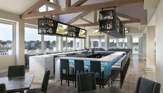 kitchen with baseboards, high vaulted ceiling, open shelves, beamed ceiling, and light wood-type flooring