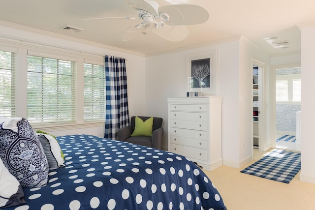 bedroom featuring visible vents, baseboards, crown molding, and a ceiling fan