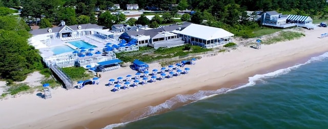 bird's eye view with a view of the beach and a water view