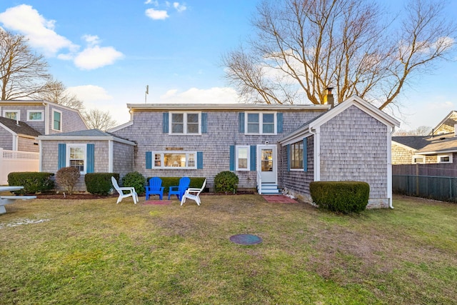 view of front of home with a front yard