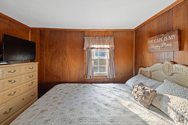 bedroom with wood walls