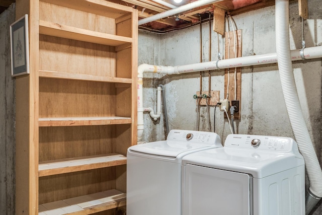 laundry room featuring laundry area and washing machine and dryer