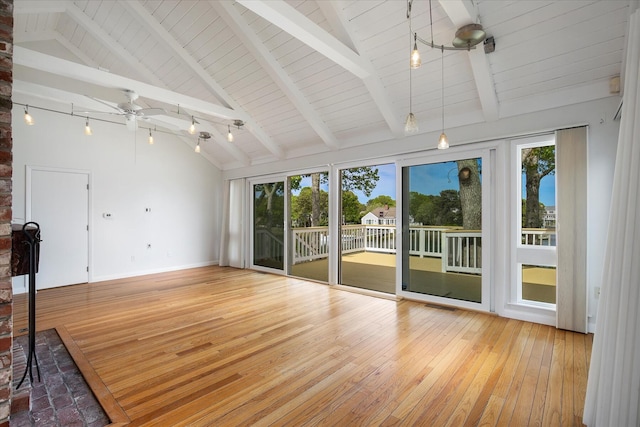 174 Waterway, Mashpee, MA 02649 - unfurnished living room featuring hardwood / wood-style floors, a ceiling fan, wood ceiling with exposed beams, baseboards, and high vaulted ceiling