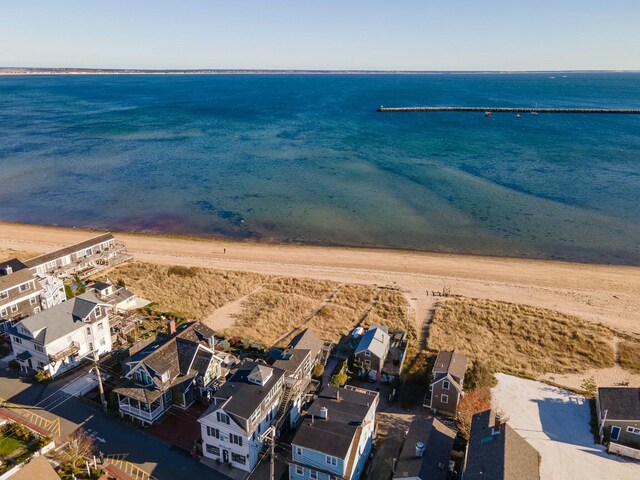 aerial view featuring a water view and a view of the beach