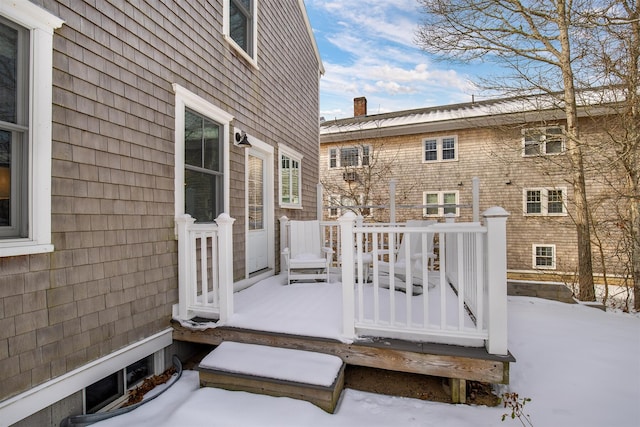 view of snow covered deck