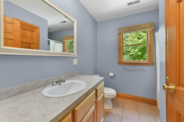 1311 Main St, Cotuit, MA 02635 - bathroom featuring vanity, toilet, tile patterned floors, baseboards, and curtained shower