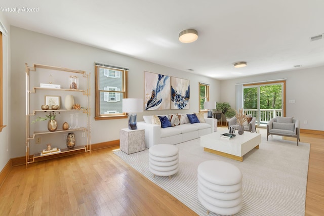 1311 Main St, Cotuit, MA 02635 - living room with wood finished floors and baseboards