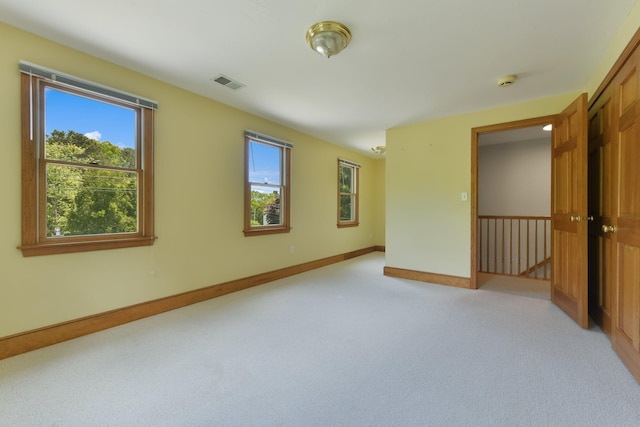 1311 Main St, Cotuit, MA 02635 - spare room featuring light carpet, baseboards, and a smoke detector