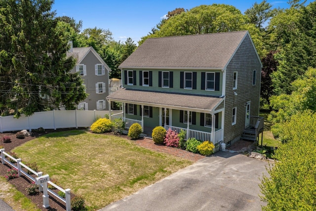 1311 Main St, Cotuit, MA 02635 - view of front facade featuring covered porch and roof with shingles