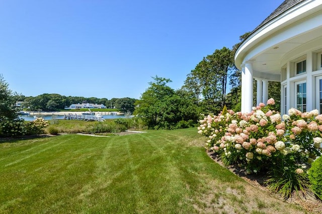 view of yard with a water view