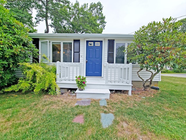 15 Fir St, Wareham, MA 02571 - view of front of home featuring a front yard