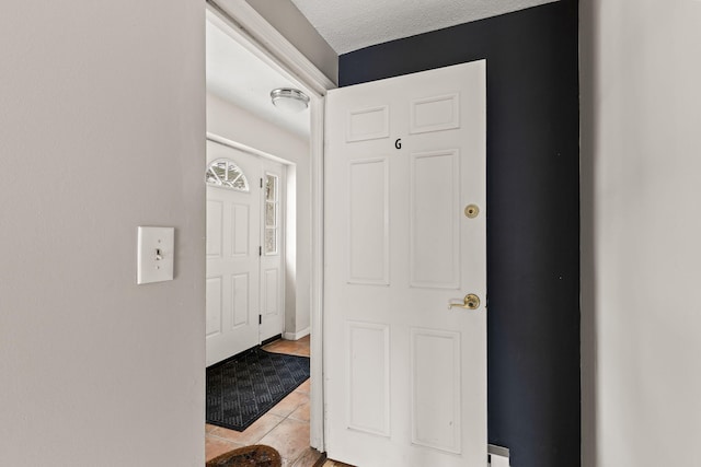733 W Main St Unit G, Barnstable, MA 02630 - foyer with light tile patterned floors