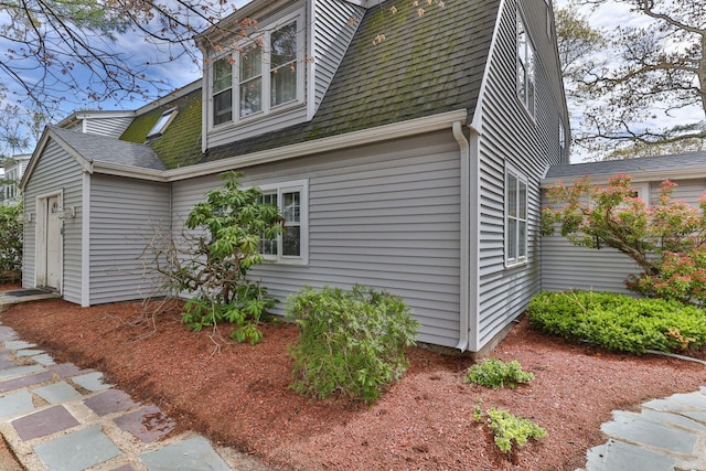 733 W Main St Unit G, Barnstable, MA 02630 - view of side of property featuring roof with shingles and a gambrel roof