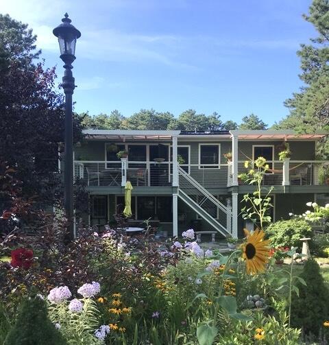 53 Highland Rd, North Truro, MA 02652 - back of property featuring stairway