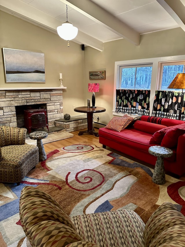 53 Highland Rd, North Truro, MA 02652 - living area with beam ceiling, wood finished floors, and baseboard heating