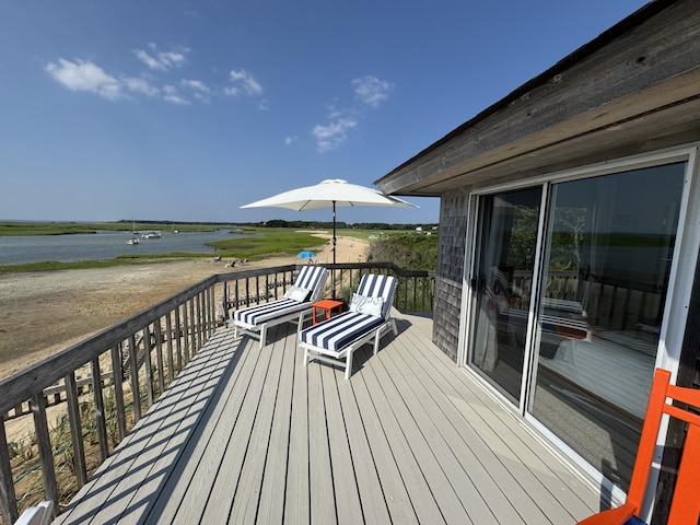20 Beach Rd, Eastham, MA 02642 - wooden terrace featuring a water view