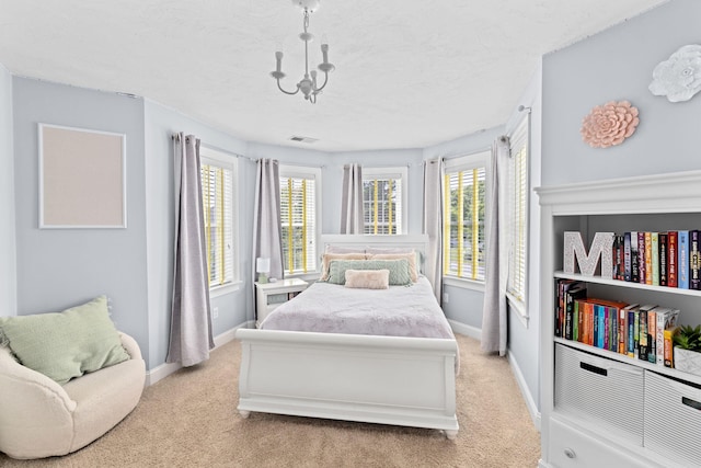 5 Bosuns Ln, Bourne, MA 02532 - bedroom featuring light colored carpet and a textured ceiling