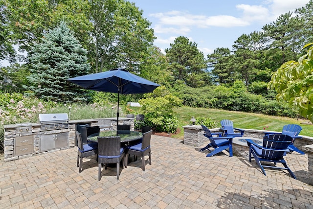 5 Bosuns Ln, Bourne, MA 02532 - view of patio / terrace featuring area for grilling, outdoor dining area, an outdoor fire pit, and view of wooded area