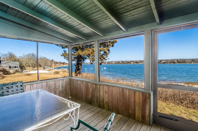 150 Old State Hwy Unit 4, Eastham, MA 02642 - unfurnished sunroom with beam ceiling and a water view