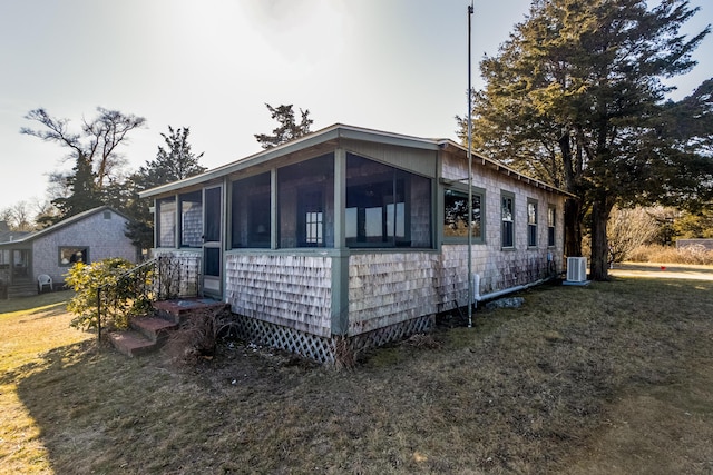 150 Old State Hwy Unit 4, Eastham, MA 02642 - view of front facade featuring a front yard and cooling unit