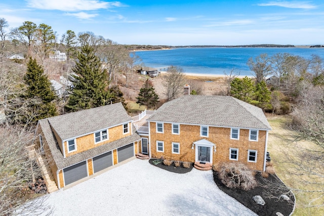 bird's eye view with a water view