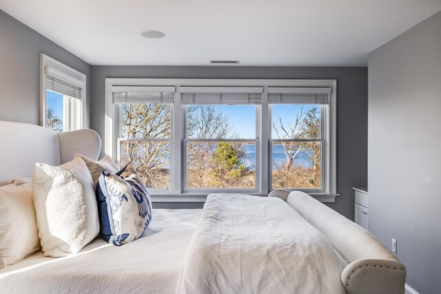 bedroom featuring visible vents