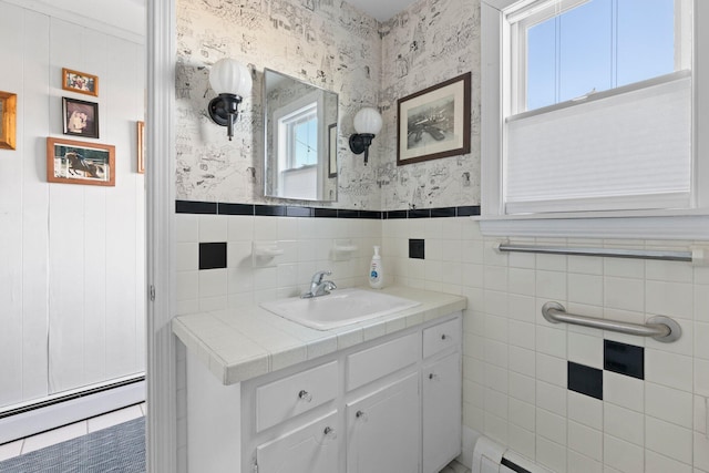 bathroom featuring vanity, tile walls, and a baseboard radiator