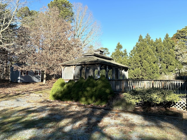 view of home's exterior with a gazebo