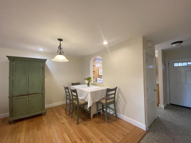 dining room with light wood-type flooring